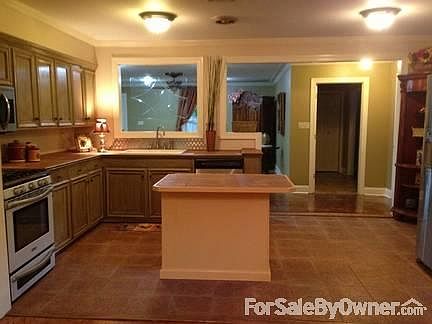 Updated kitchen with plenty of room to entertain.