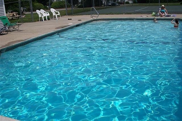 Pool area and tennis court