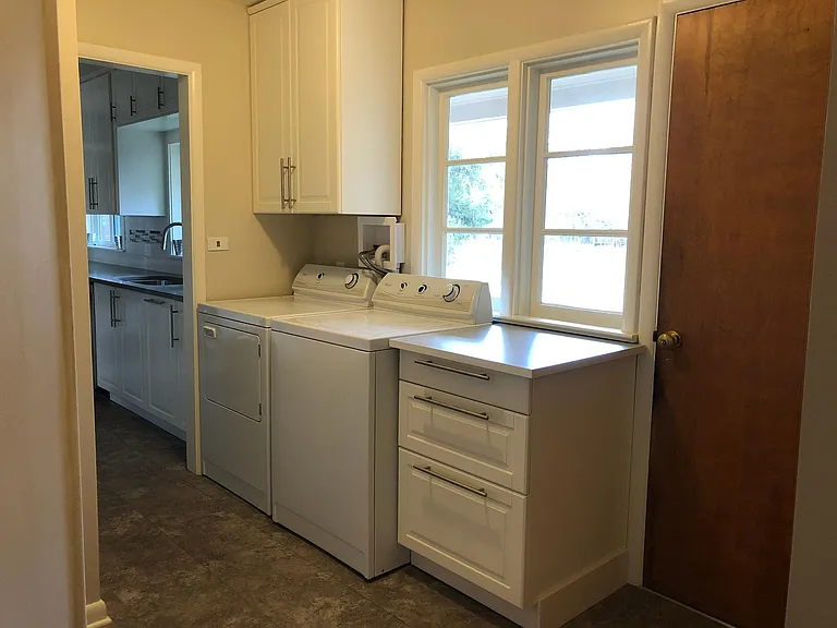 Laundry and Back Entrance in Mudroom next to Kitchen