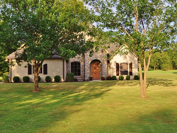 sprinkler in flower beds