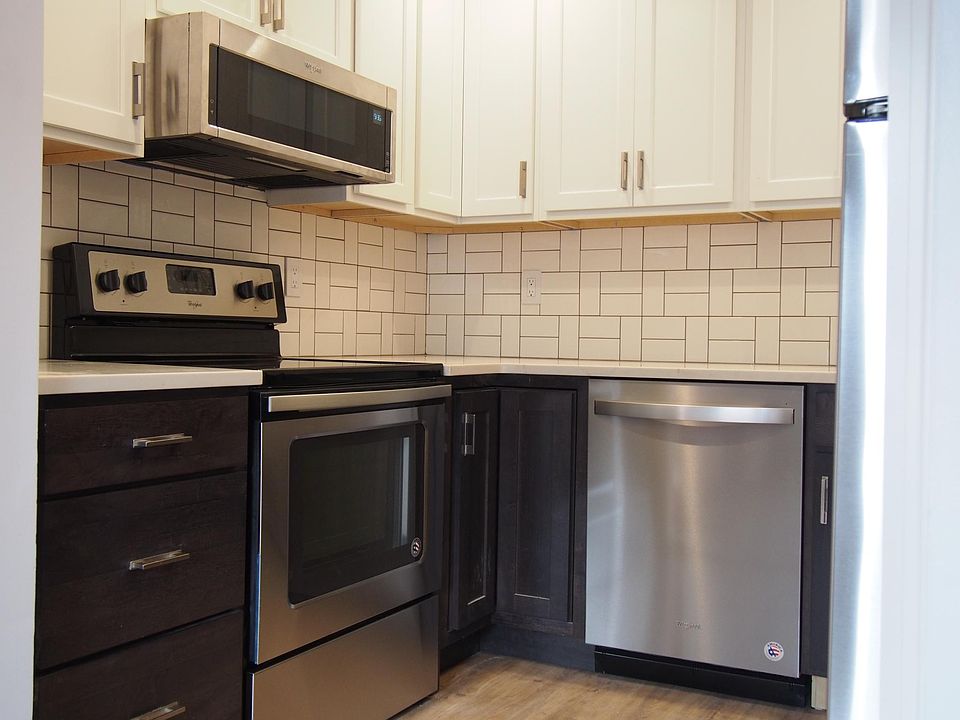 Kitchen - Tons of new cabinets, stainless appliances, garbag