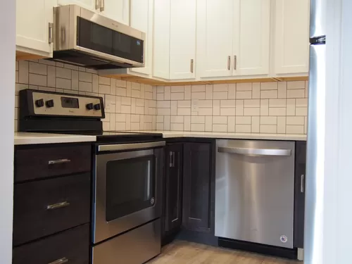 Kitchen - Tons of new cabinets, stainless appliances, garbag - Martin Luther King Jr Way