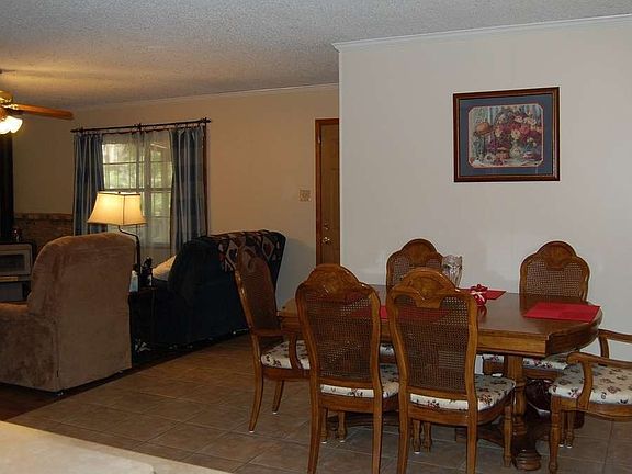 "Breakfast area opens to kitchen and living areas."