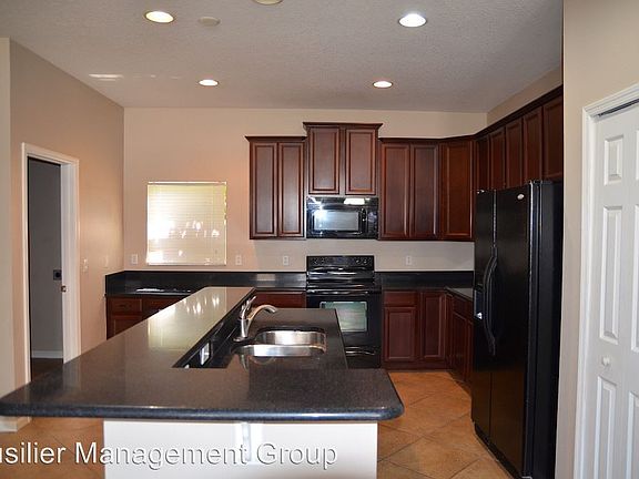 4th image of 2837 Wild Tamarind Blvd