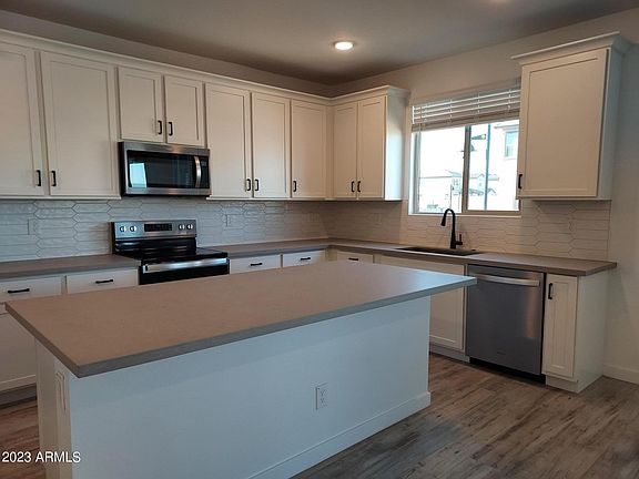 5th image of 15031 W DESERT BLOOM Street