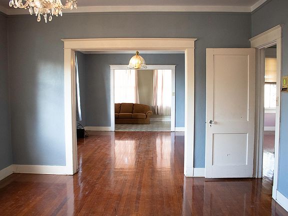 Gorgeous hardwood floors and woodwork in Dining Room and Living room.