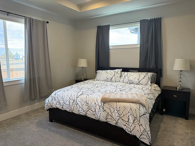 Master bedroom with door to back patio.