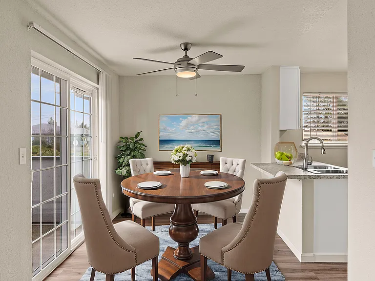 Experience the comfort of this beautifully designed dining area, perfect for gatherings.