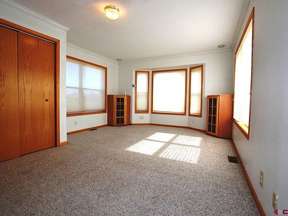 Use as a bedroom or office, sunny exposure, nice views of the creek, mountains and valley.