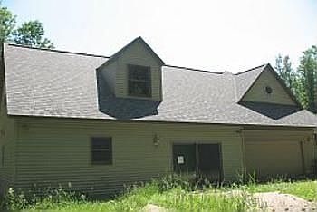 Another view of the west side of this home, this new addition just needs your interior finishing ideas.