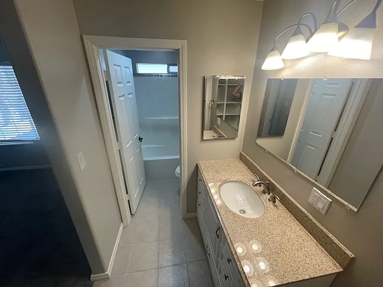 8332 Huxley St — Photo 12