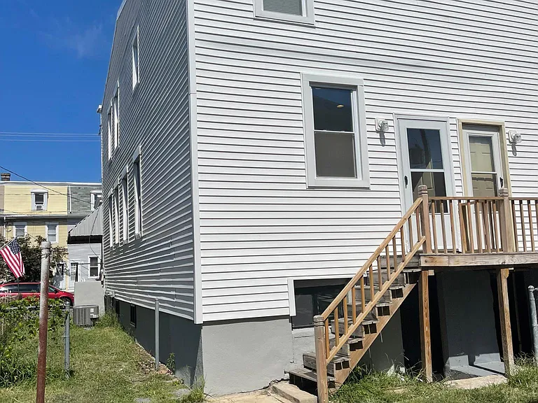 Backyard with side entrance