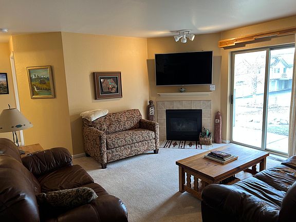 living room with sleeper love seat