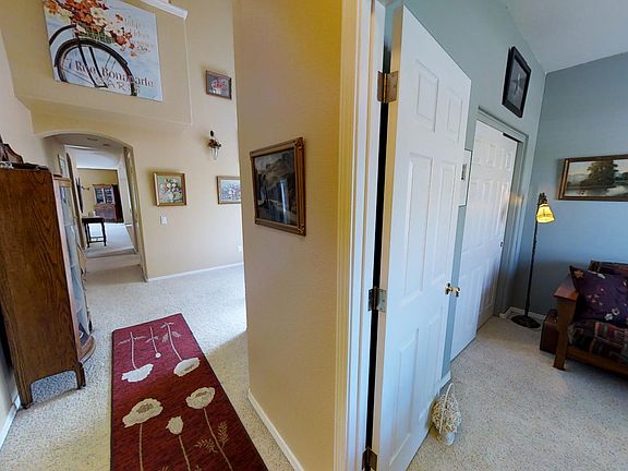 Front entrance, den to right