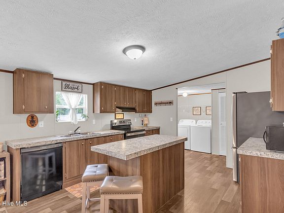 5th image of 414 Sherrow River Drive SW