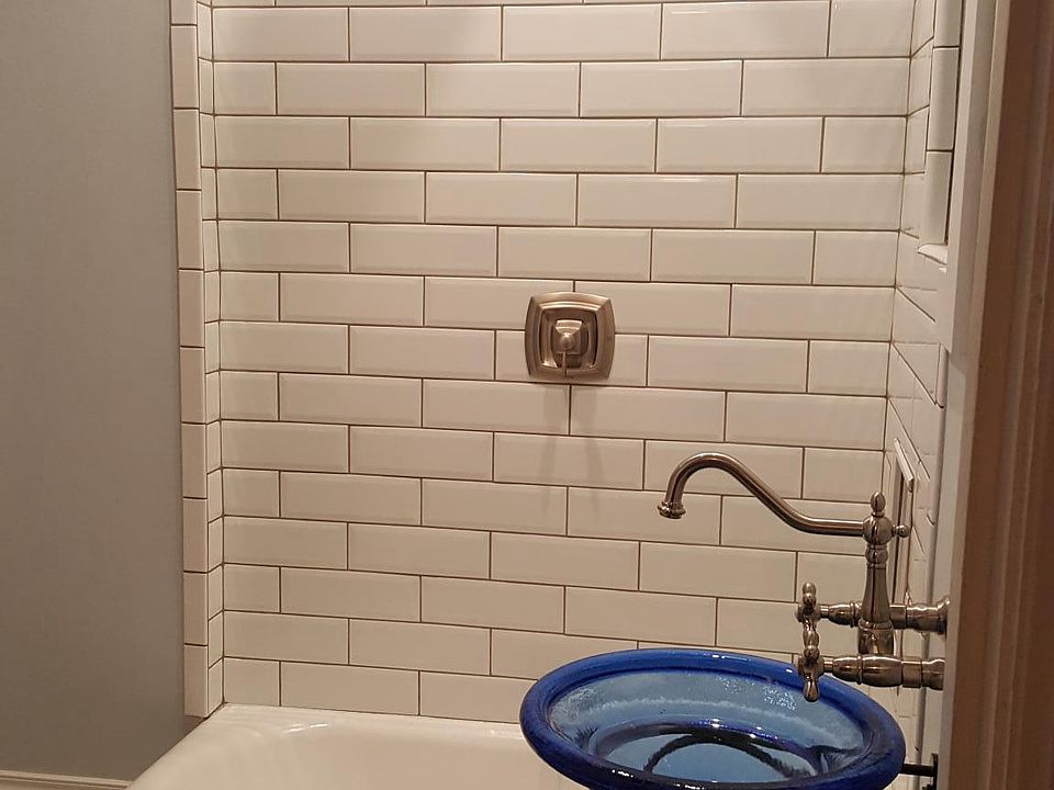 Updated tile rain head showe8r and vessel sink