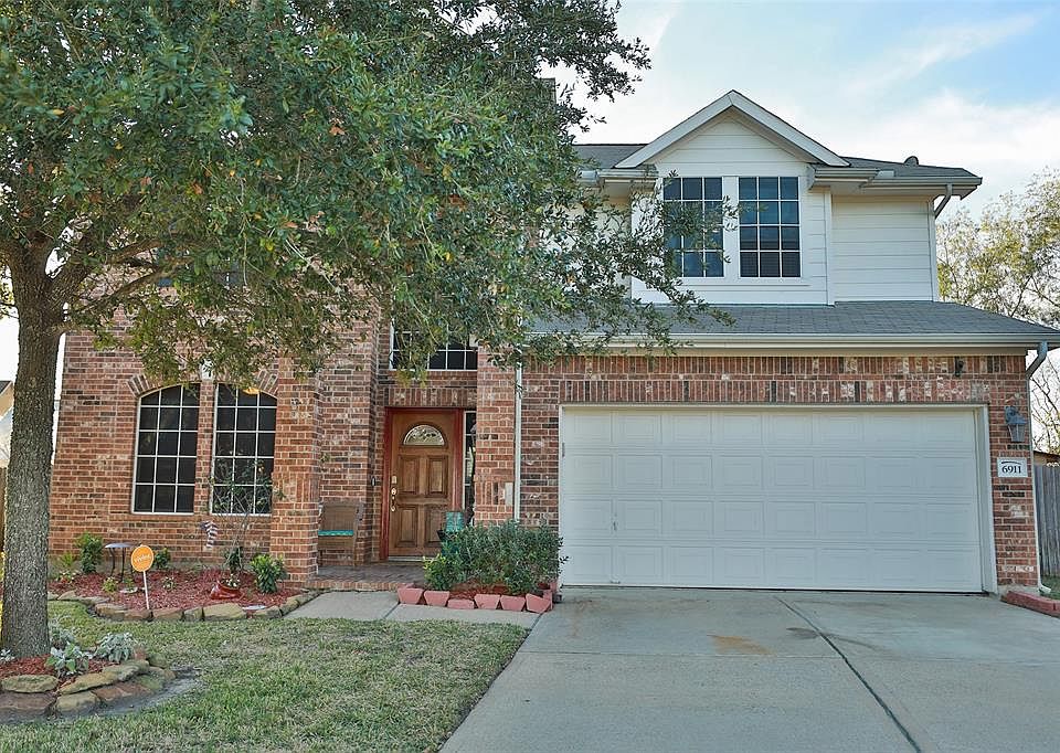 Nestled on a quiet culdesac with huge lot!