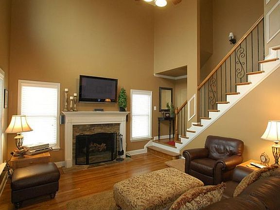 True hard woods on main and iron spindals on stairs