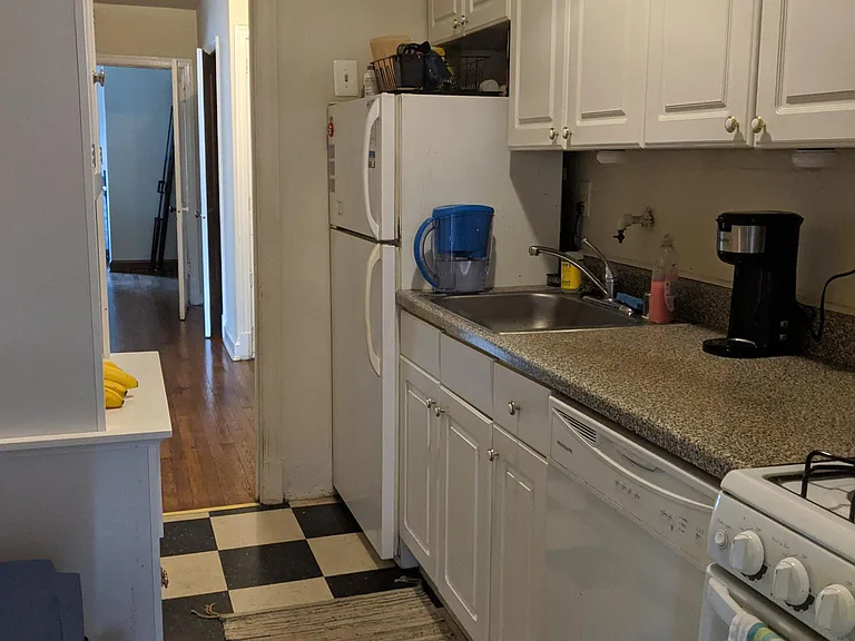 Another kitchen view with lots of cabinet space