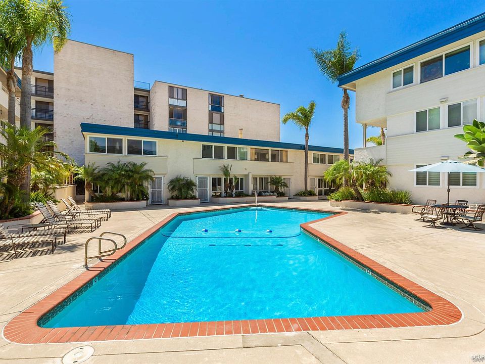 Pool w/Property in Background - Left End Unit