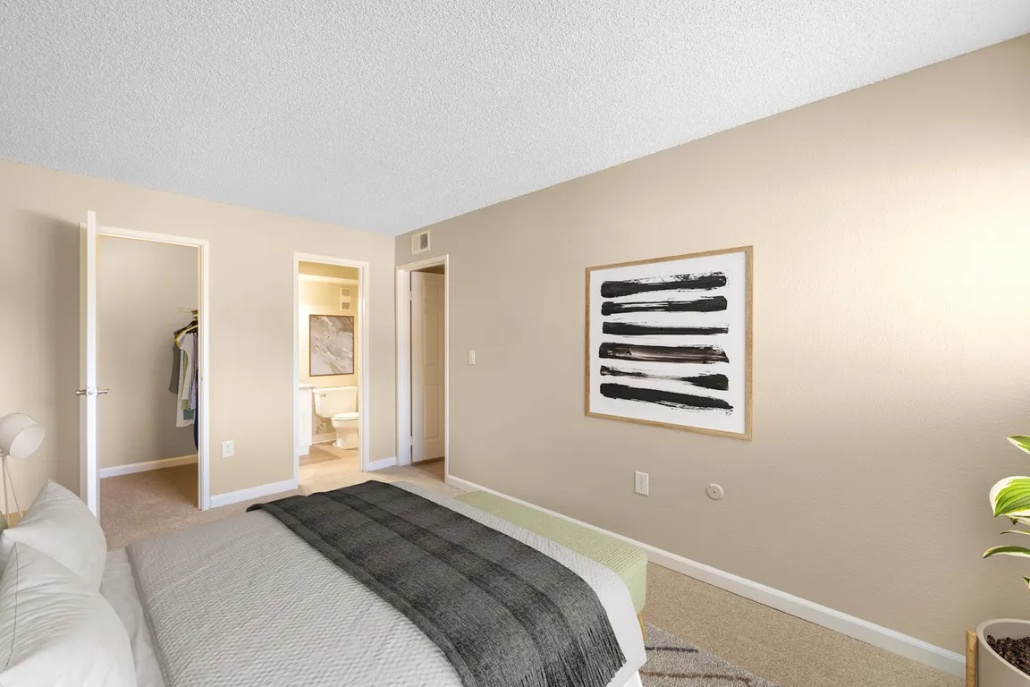 Bedroom with Ensuite Bath and Walk-in Closet