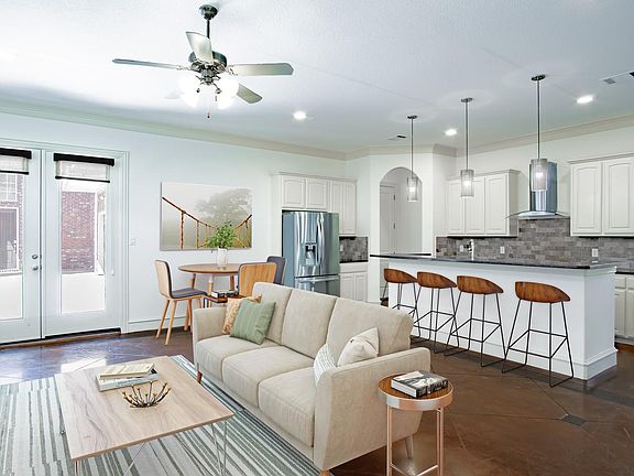 This image shows a virtually furnished space. This space come unfurnished.