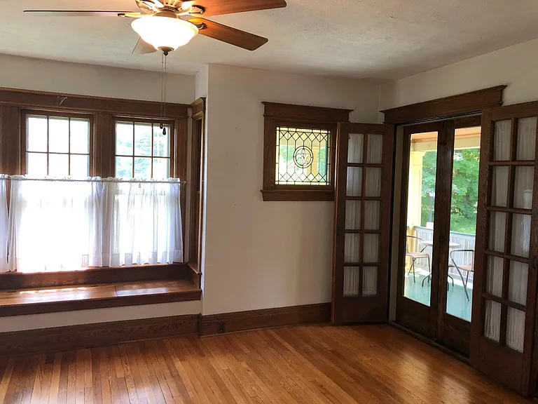 Living room, French doors leading to front porch.