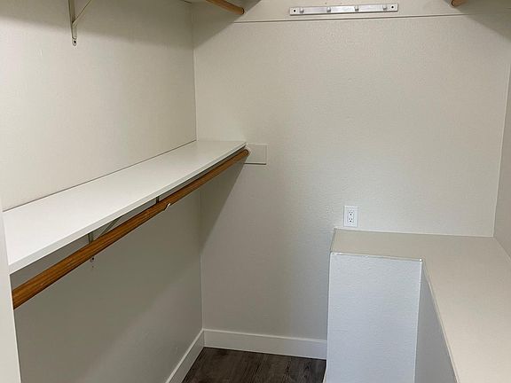 Primary Bedroom walk in closet with plenty of storage