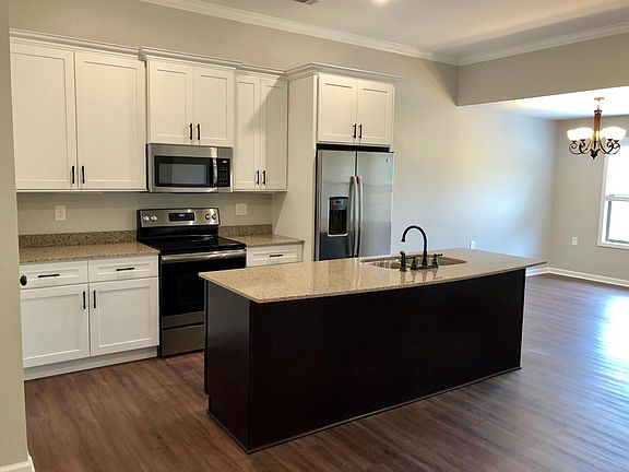 Custom kitchen with soft close drawers, under cabinet lighti