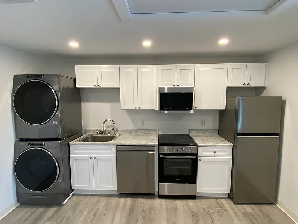 new kitchen and laundry in unit