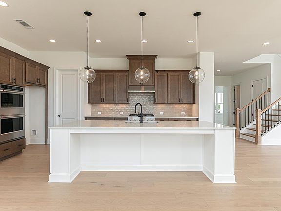 Large center island in kitchen