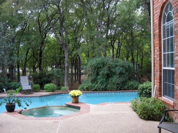 Pool & Spa backs to park.