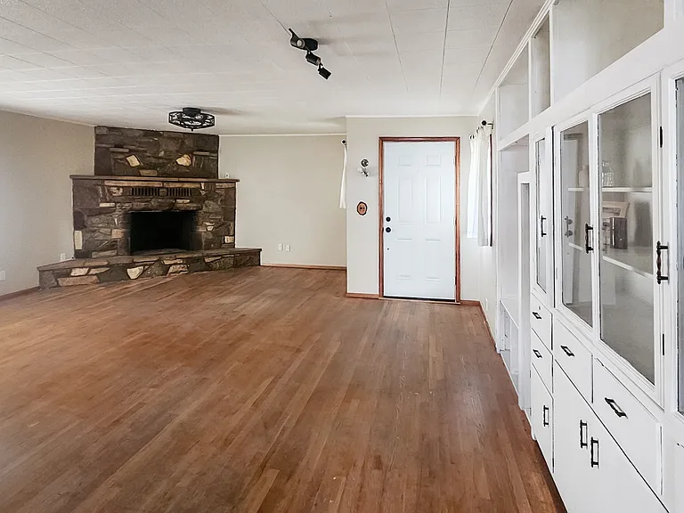 Entry and Living Room with New Gas Insert Fireplace and unique built ins