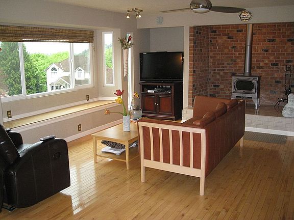 living room with wood burning stove