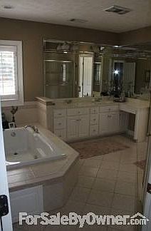 Master Bathroom
						:
						Dual vanity, jetted tub, walkin shower with two shower heads, two linen closets