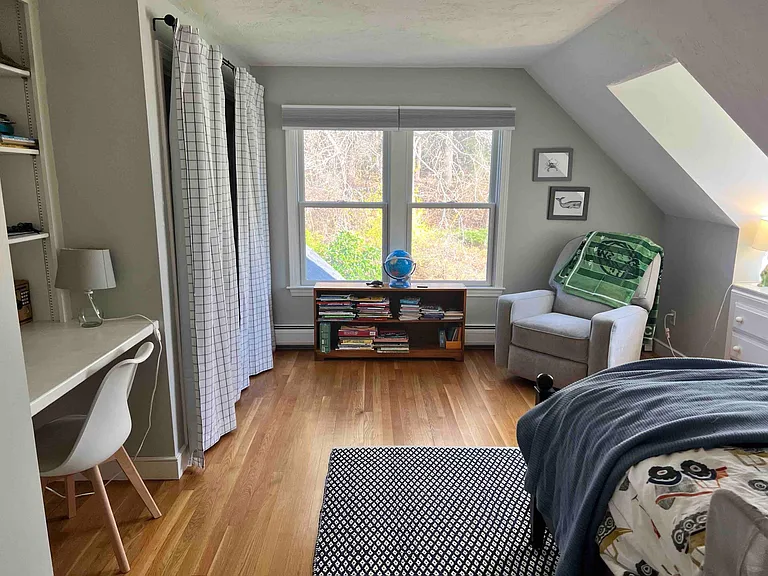 third upstairs bedroom, 1 extra long twin bed, built-in desk and 2 built-in chests of drawers