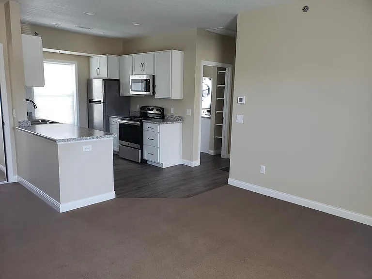 View from Living Room looking toward kitchen and bath