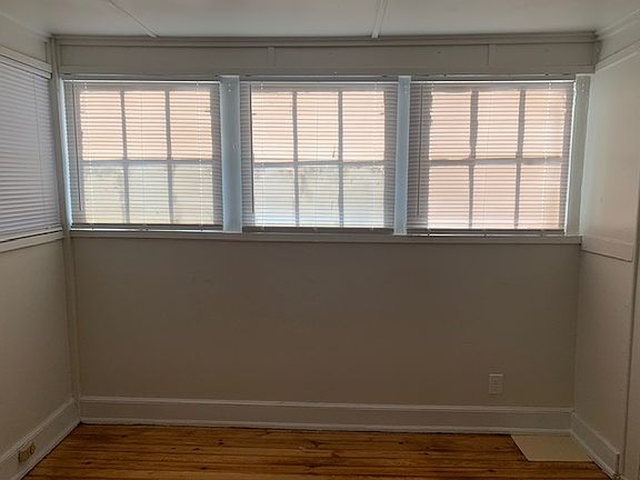 Refinished Hardwood Floors in Sunroom