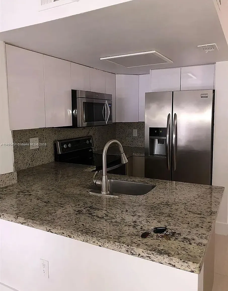 8670 NW 6th Ln — Photo 3