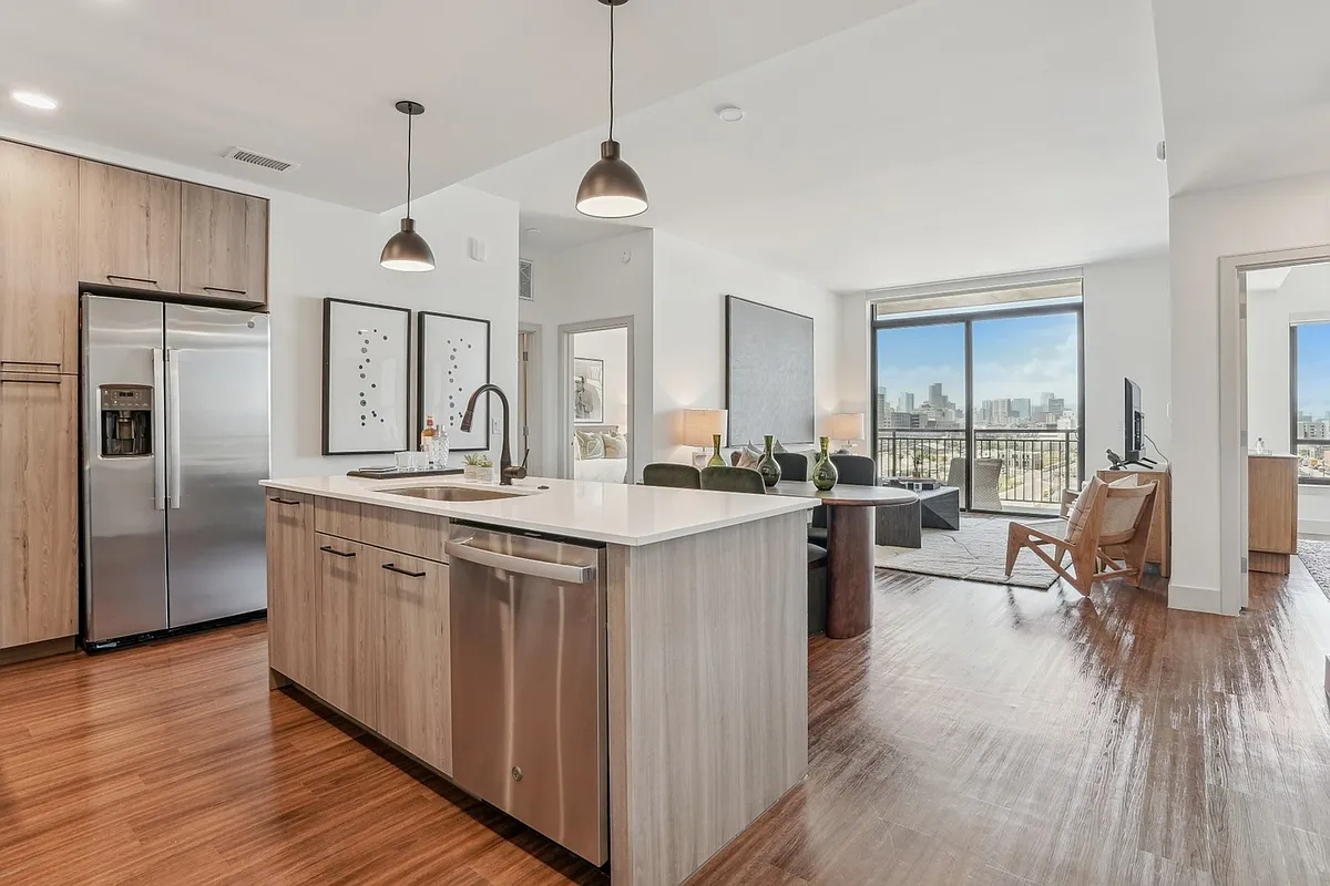 Enjoy effortless living with this beautifully connected kitchen and living area. - Mica RiNo