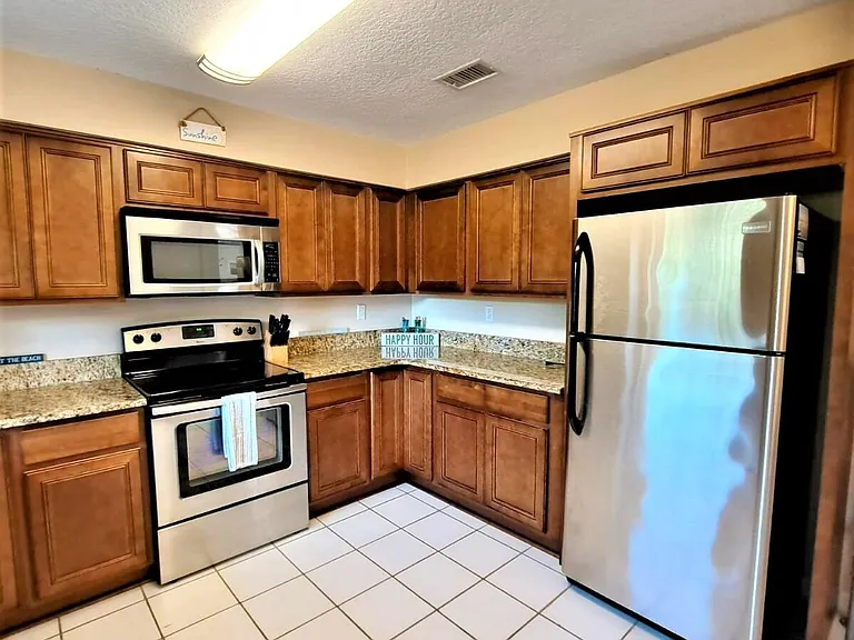 Furnished Kitchen with Stainless Steel Appliances