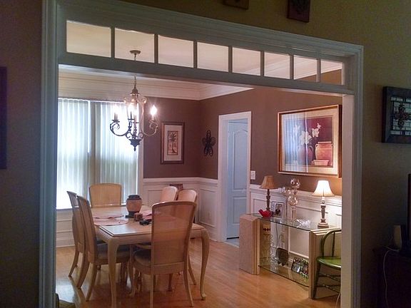 Dining room
						:
						Extensive trim work with transom