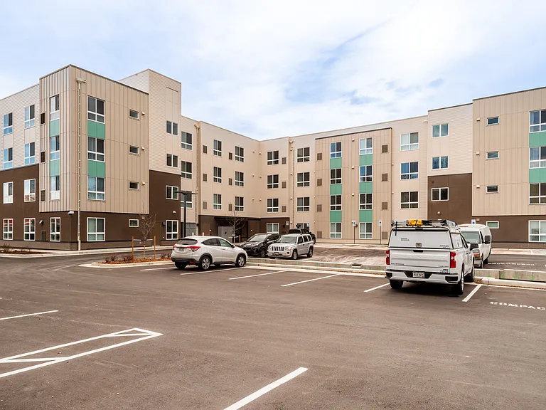 Parking lot for the main entrance of All Saints Apartments