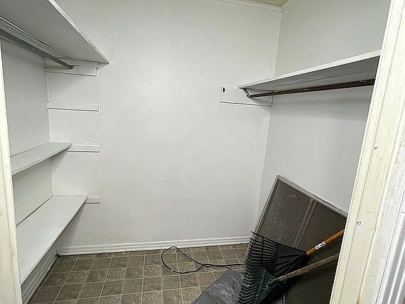 room 1 walk in closet