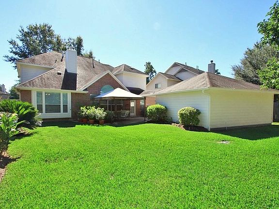 The beautiful Back Yard provides a wonderful lawn with room for a pool!