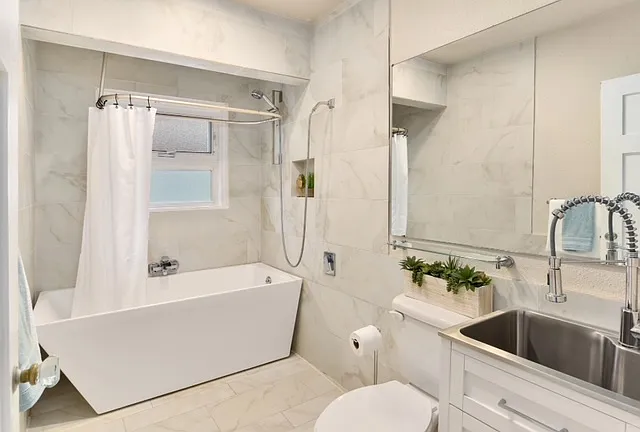 Bathoom with soaking tub and great washing sink!