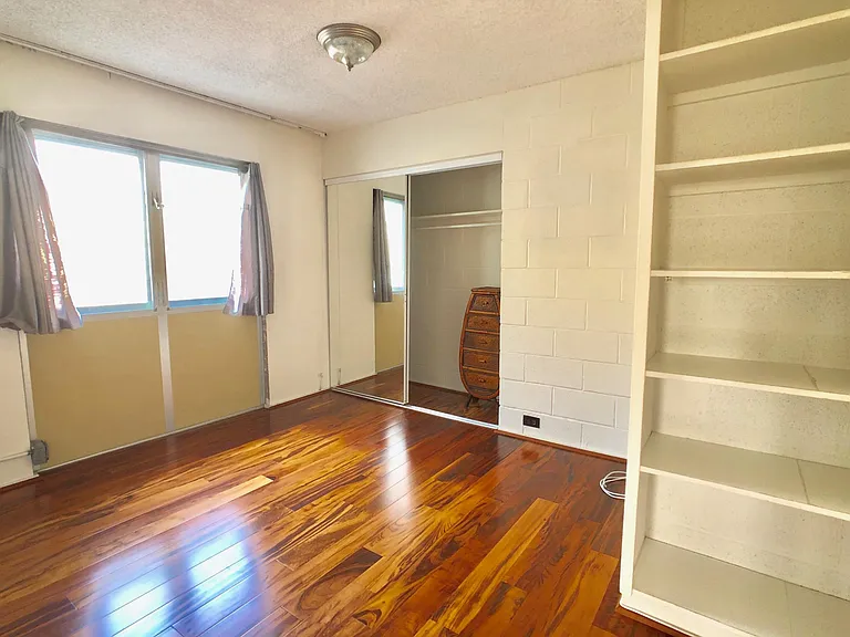 Bedroom with ample storage. AC portable unit.