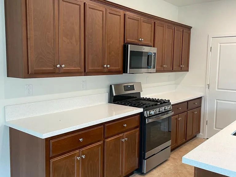 Kitchen Area-Stove and Closets