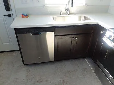Beautiful kitchen with quartz countertops and stainless steel appliance