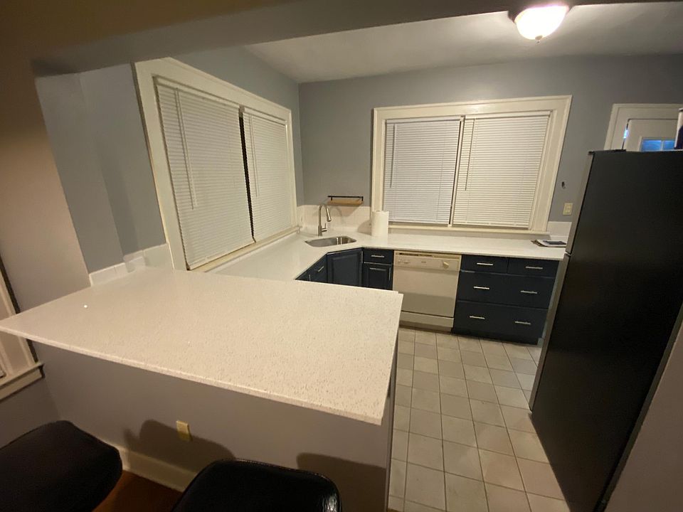 Kitchen and bar to Dining Room